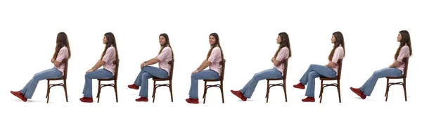 Beyaz Arka Planda Oturan Aynı Genç Kızın Yan Görüntüsü — Stok fotoğraf