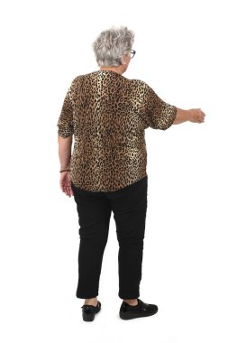 back view of a senior woman shaking hands with imaginary person on white background clipart