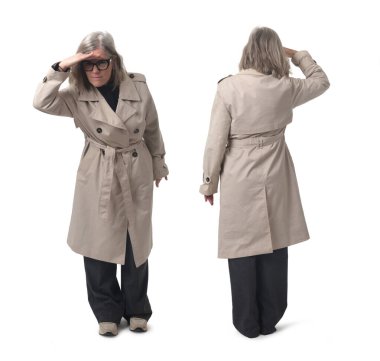front and bavck view of a same woman looking away with hand on forehead on white background