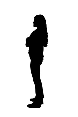  Kollarını kavuşturmuş genç bir kızın yan görünüşü.  