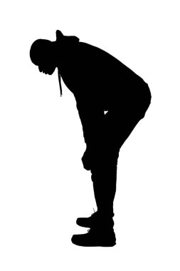silhouette of   side view of a man crouched down and looking the floor on white background