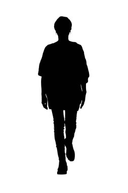 silhouette of  front view of a full length portrait of woman walking  in tight jean pants looking at camera 