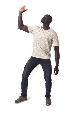front view of a man pressing up with one hand on white background
