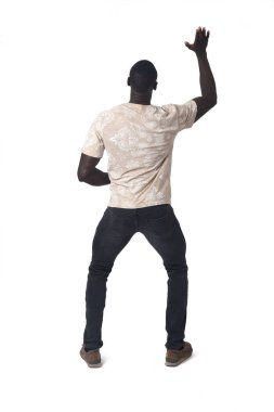 back view of a man push up with one hand on white background