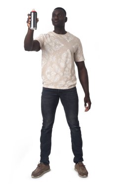 front view of a man painting with spray paint on white background