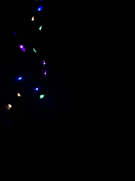 Hintergrund Neon Kleine Farbige Glühbirnen Der Ecke Auf Schwarzem Hintergrund — Stockfoto