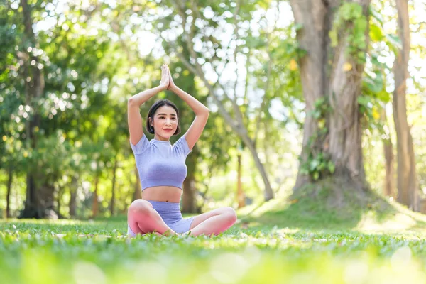 stock image The Girl exercise in the Beautiful garden. High quality photo