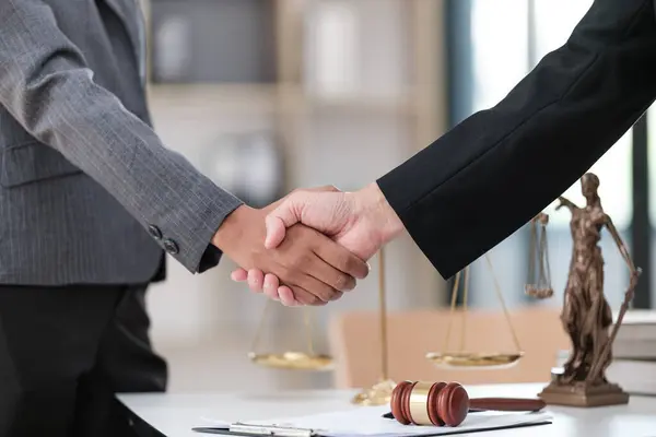 stock image Lawyer office. Statue of Justice with scales and lawyer working on a laptop. Legal law, advice and justice concept. . High quality photo