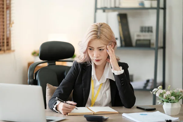 stock image Close up on laptop in office, Asian happy beautiful businesswoman in formal suit work in workplace. Attractive female employee office worker smile. High quality photo