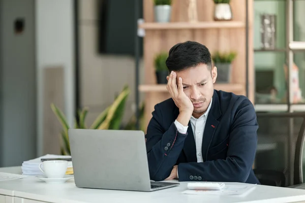 stock image Stressed business man working in the office. High quality photo