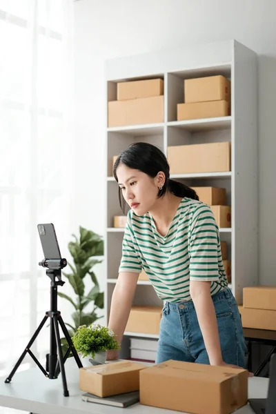 Asian woman live streaming online for selling at home. High quality photo