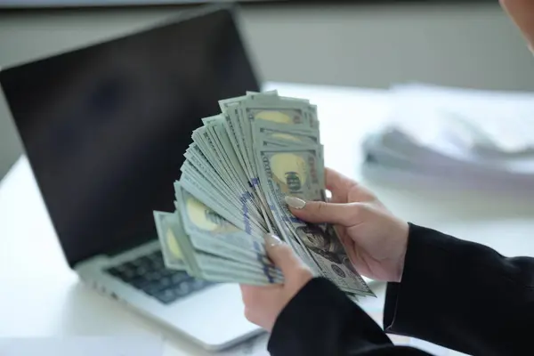 Close Up business woman Asian businesswoman financial bookkeeper girl in an office entrepreneur counting money cash count salary profit finance jackpot earn investment budget dollars banknotes. High