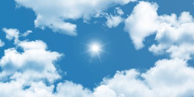 Big white clouds and shining sun in blue sky. Bottom-up view of the sky.