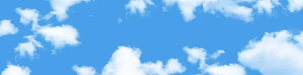 Cloudy blue sky. Horizontal and long sky background. It can be used as a banner, wallpaper, stretch ceiling decoration image and design element.