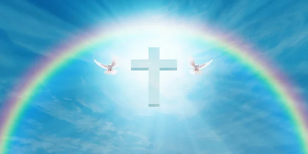 White doves flying in the blue sky. Christian cross, rainbow and sunlight. Religious concept. Can be used as wallpaper and design element.
