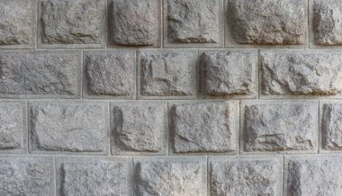 Taş duvar yüzeyi. Eski taşlardan ve taşlardan yapılmış duvar