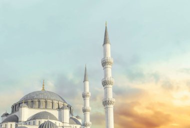 Mosque landscape in beautiful sunset. Islamic background photo. Can be used as social media post, greeting card and ramadan concept background image.