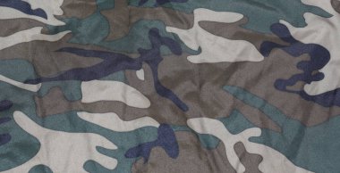 Askeri kamuflaj desenli kumaş. Avlanma ve ordu kamuflaj görüntüsü.