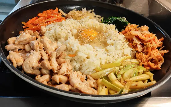 Bibimbap dish of meat, rice, vegetables and egg