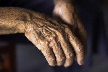 The asian old woman's hand was alone. Grandma's hands and grandchildren's