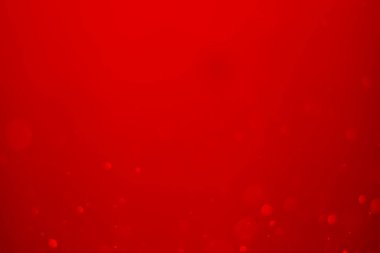 Kırmızı parıltılı klasik ışık arka planı. kırmızı bokeh koyu arkaplanda parlıyor.