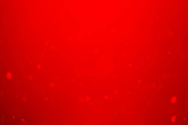 Kırmızı parıltılı klasik ışık arka planı. kırmızı bokeh koyu arkaplanda parlıyor.