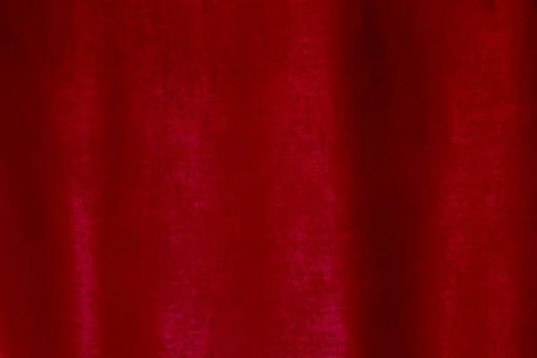 Red cloth background soft wrinkled fabric pattern and surface