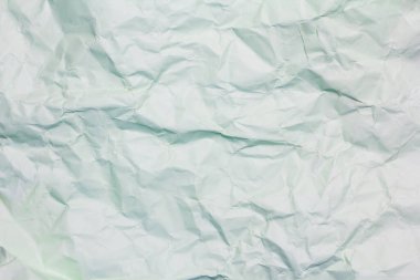 Beyaz buruşmuş kağıt doku arka planı. Beyaz kumaş dokusu kumaşı katlar.
