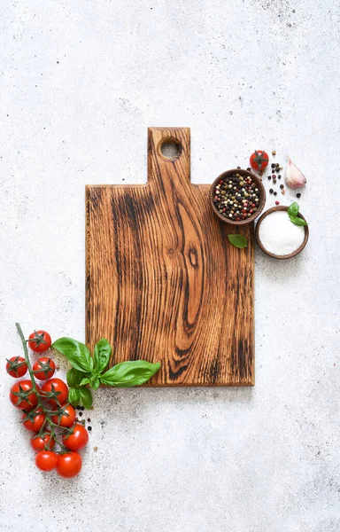 stock image Various spices, cherry on the kitchen board. Copy space for text. Food, kitchen ingredients for cooking. 