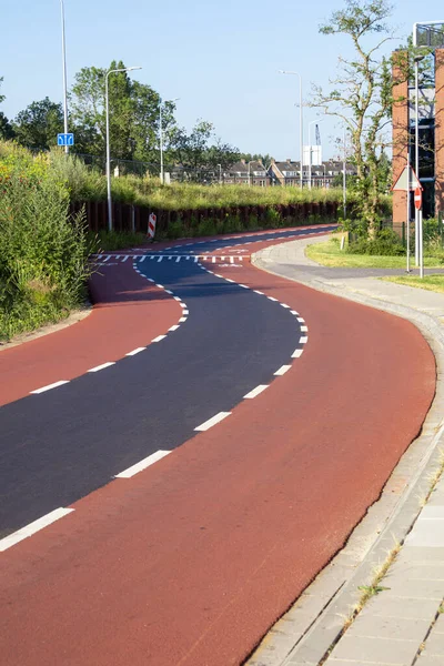 stock image Shot of bike path in the city - safe movement of people on bicycles. The concept of a healthy lifestyle and the struggle for ecology.