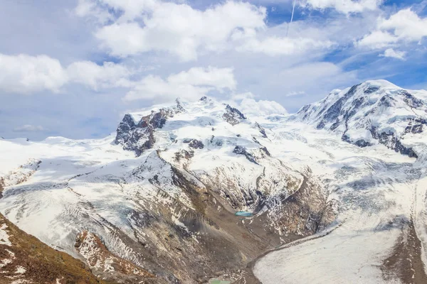 有名なゴーナー氷河と印象的な雪をかぶった山々とペニーネアルプスの壮大なパノラマモンテ ローザ マッシフツェルマット スイスに近い — ストック写真