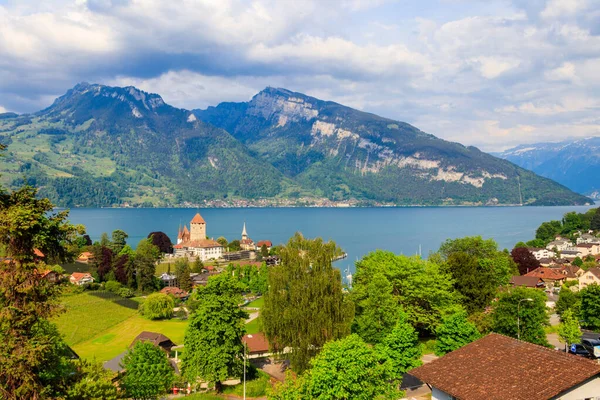 stock image Aerial view of Spiez town with Spiez castle and Lake Thun in the Bernese Oberland, Switzerland