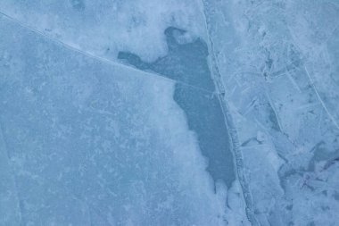 Çatlak buzun dokusu. Kış arkaplanı