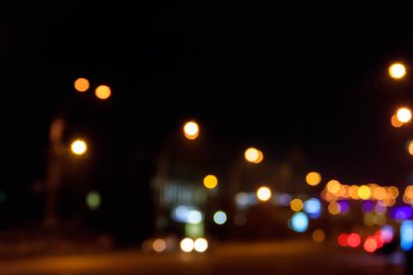 Bokeh blurred car lights at night. Abstract background