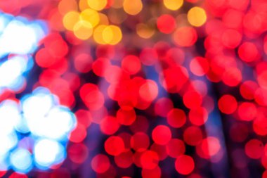 Şenlikli, çok renkli, soyut, bulanık bir arkaplan. Noel ışıkları arka planı bokeh