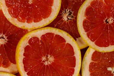 Arkaplan olarak taze greyfurt dilimleri