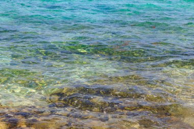 Mavi su dokusu arka planı. Denizin ya da okyanusun yüzeyi