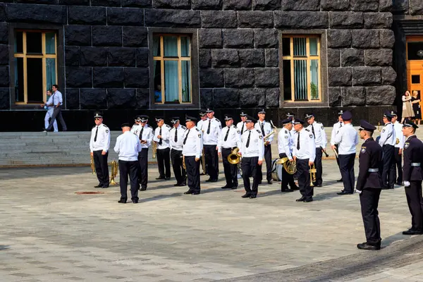 Kiev, Ukraine - August 23, 2019: Police orchestra near the Building of Cabinet of Ministers during the celebration of Day of State Flag of Ukraine