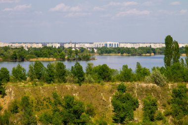 View on the river Dnieper and city Komsomolsk clipart