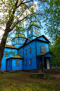 Old wooden church in in Open air Museum of Folk Architecture and Folkways of Middle Naddnipryanschina in Pereyaslav, Ukraine clipart