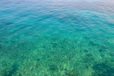 Mavi su dokusu arka planı. Denizin ya da okyanusun yüzeyi