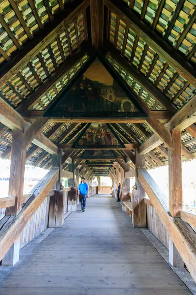 stock image Lucerne, Switzerland - April 13, 2022: Inside view of Spreuer bridge spanning the river Reuss in the city of Lucerne, Switzerland