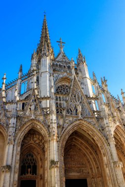 The church of Saint-Maclou church in Rouen, France. One of the best examples of the Flamboyant style of Gothic architecture in France clipart