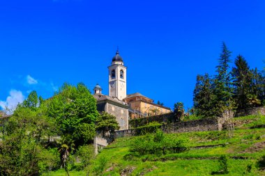 Sanctuary of the Crucifix on the Sacred Mount Calvary of Domodossola, a UNESCO World Heritage site, is one of most important religious and historical sites in Piedmont, Italy clipart