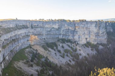 View of Creux Du Van, the amphitheater shaped rock formation, which is 1400 metres wide and 150 metres deep, in Neuchatel canton, Switzerland