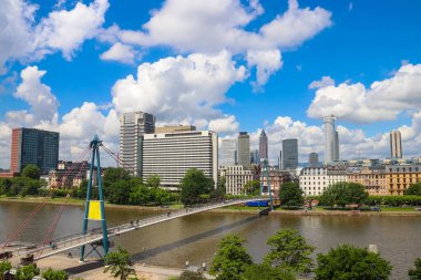 Frankfurt am Main skyline with skyscrapers and bridge over the Main river, Germany