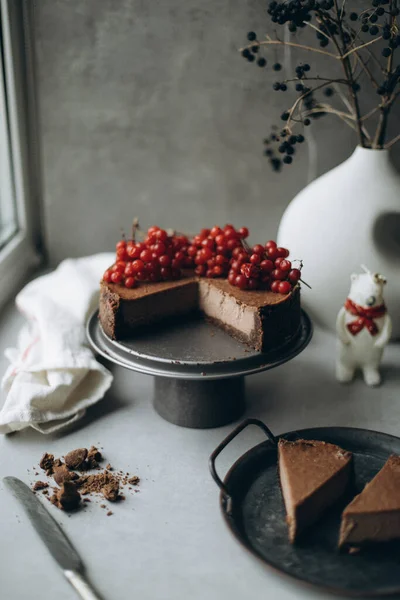 chocolate mousse cake with cream and nuts, selective focus