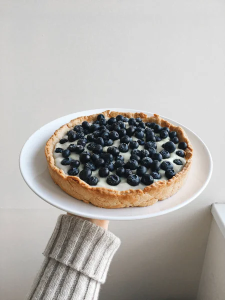 delicious homemade pie with blueberries and blackberries on white background