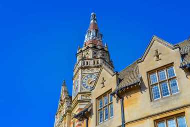 UK, Cambridge, 29.03.2024: Facade of the building housing Lloyds Bank in Cambridge with a clock tower clipart