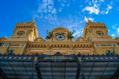 Principality of Monaco, Monaco, 13.2.2024: The magnificent facade of the Opra de Monte-Carlo next to the famous casino clipart